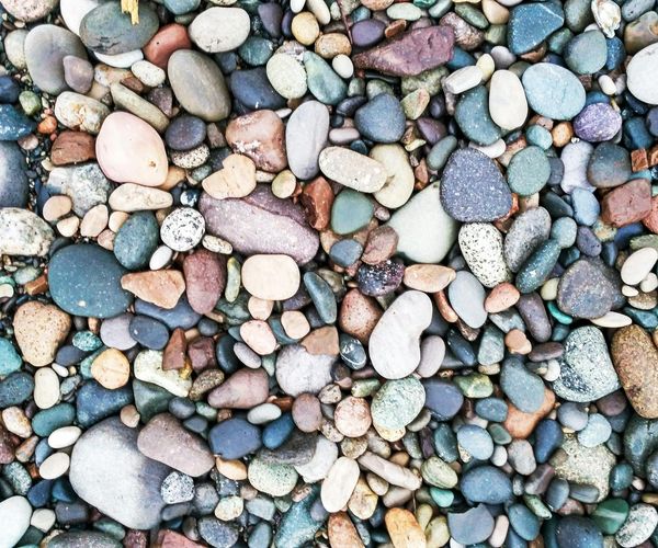 Symmetric composition of stones and leaves representing balance